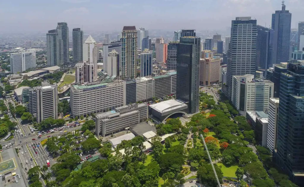 Makati City property investment guide featuring the Ayala Avenue central business district skyline property investment in makati makati cbd property investment makati rental investment